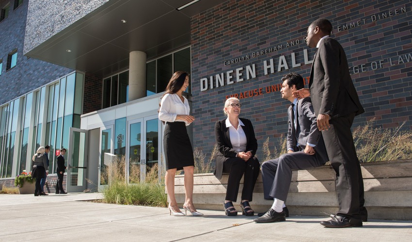 Exterior of Dineen Hall College of Law with students