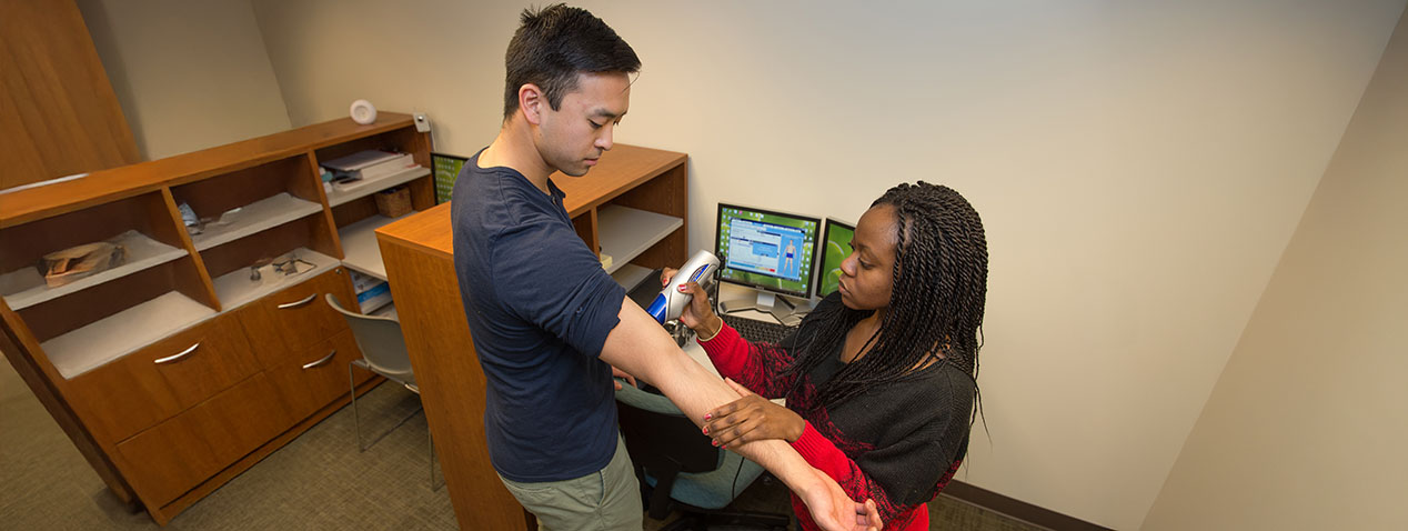 Student helping with vacation and health study