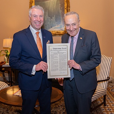 Dean David Van Slyke and Sen. Chuck Schumer