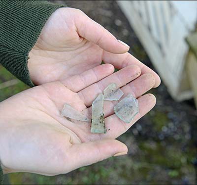 Jessica Bowes pieces of glass Hands holding a piece of glass