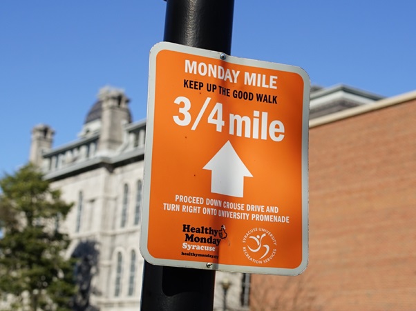 A signpost that reads "Monday Mile"