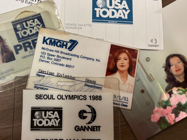 An arrangement of press passes belonging to Denise Kalette